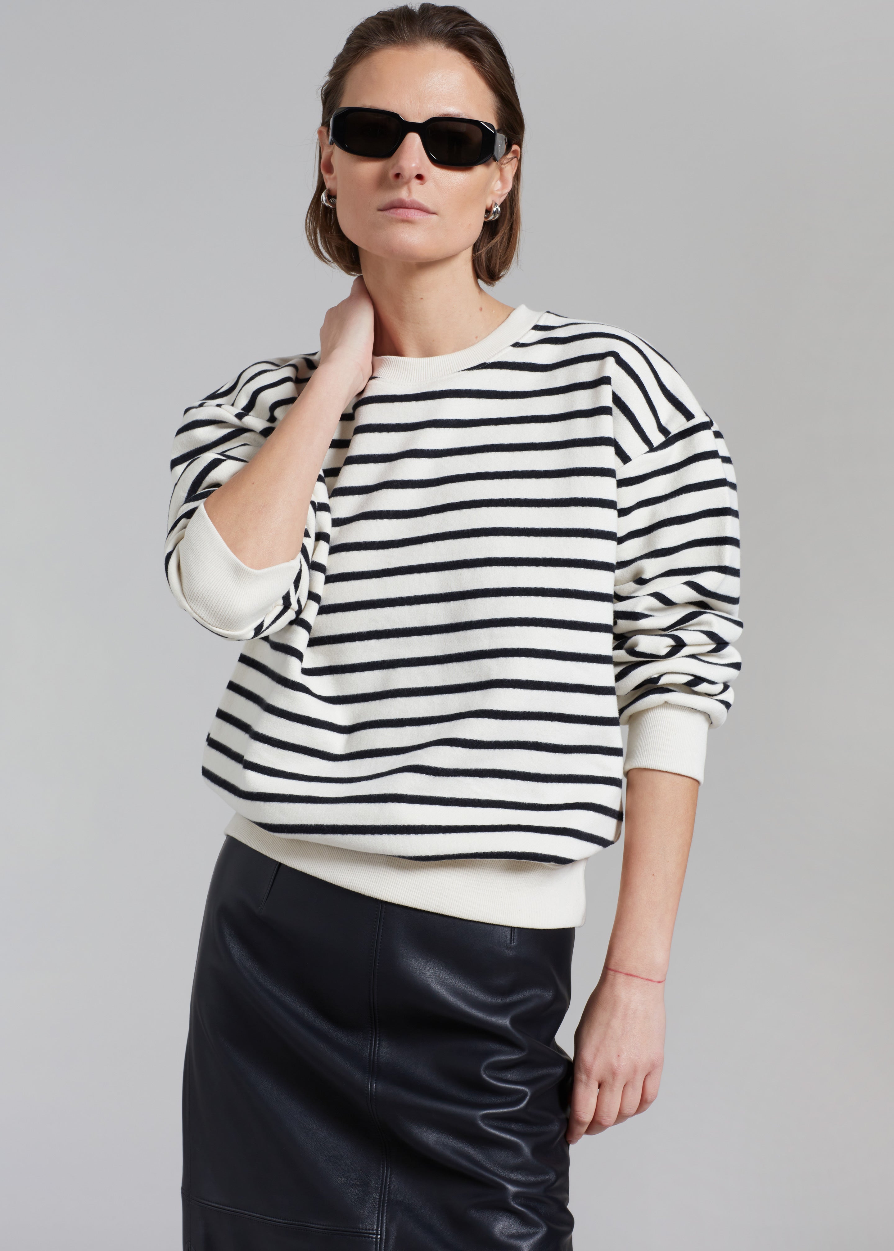 Black sweatshirt with white stripes on sleeves Clearance
