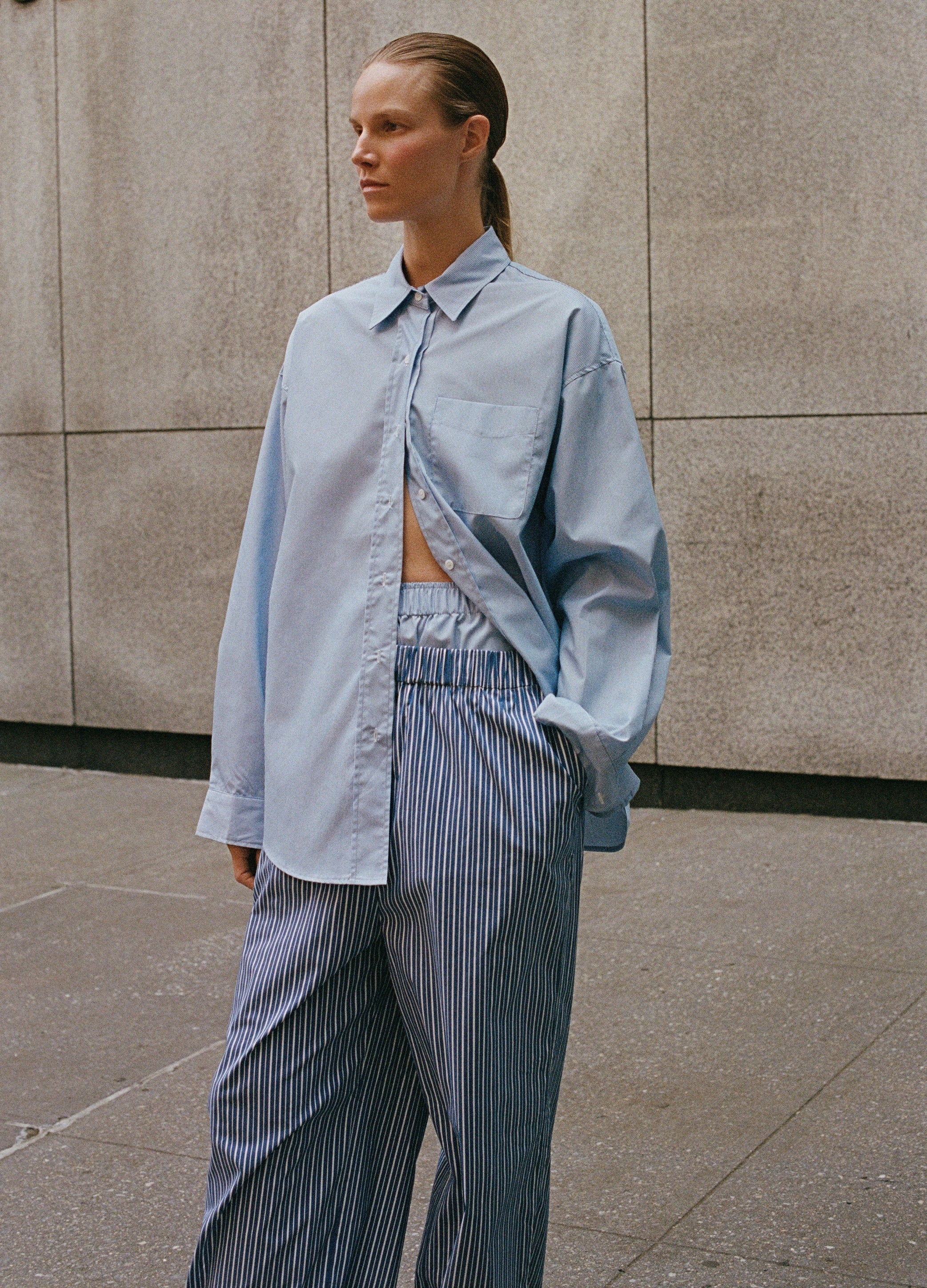 The Frankie Shop in the street model wearing the Mirca pants.