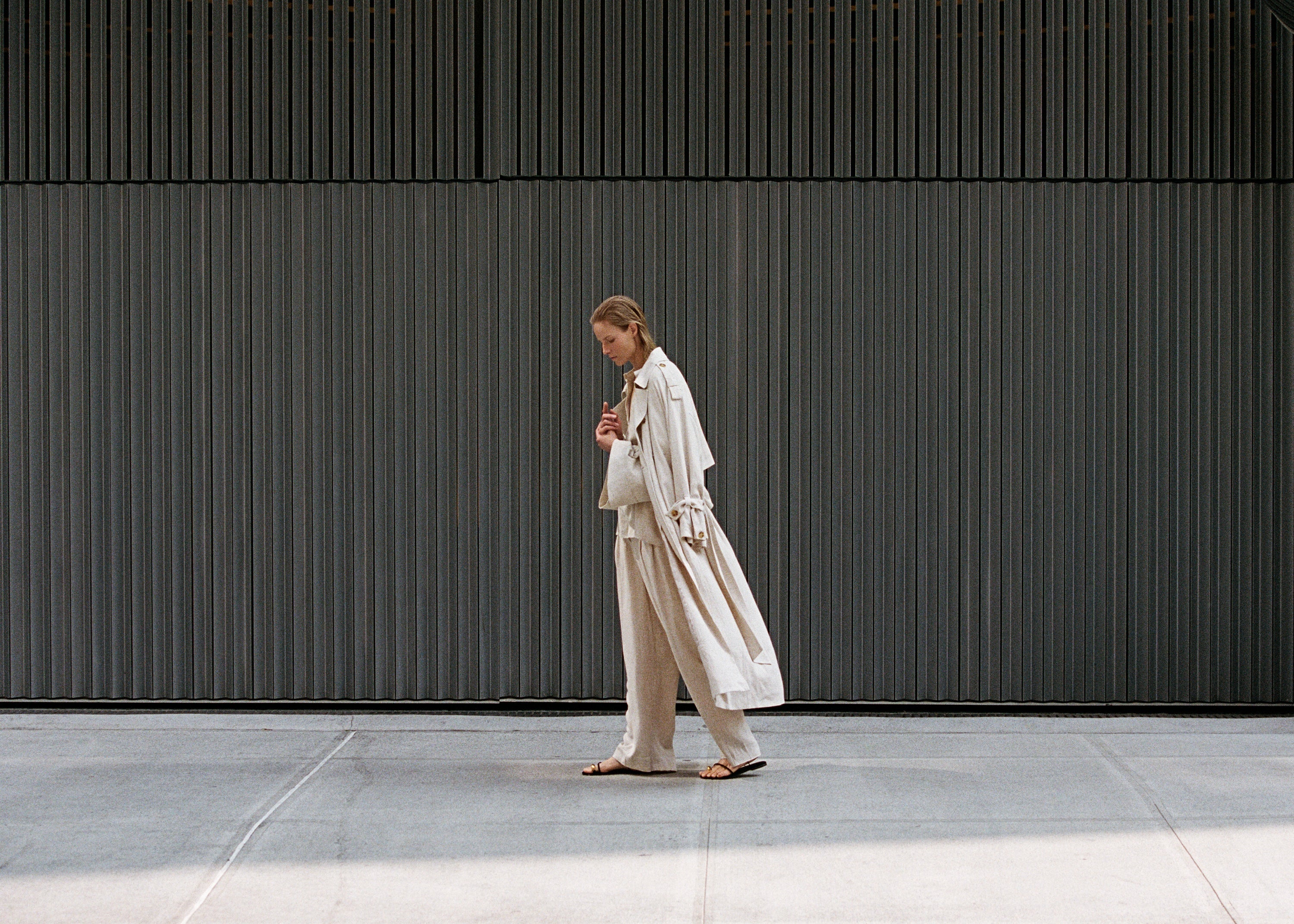 The Frankie Shop model photographed in New York City wearing an all beige outfit. 