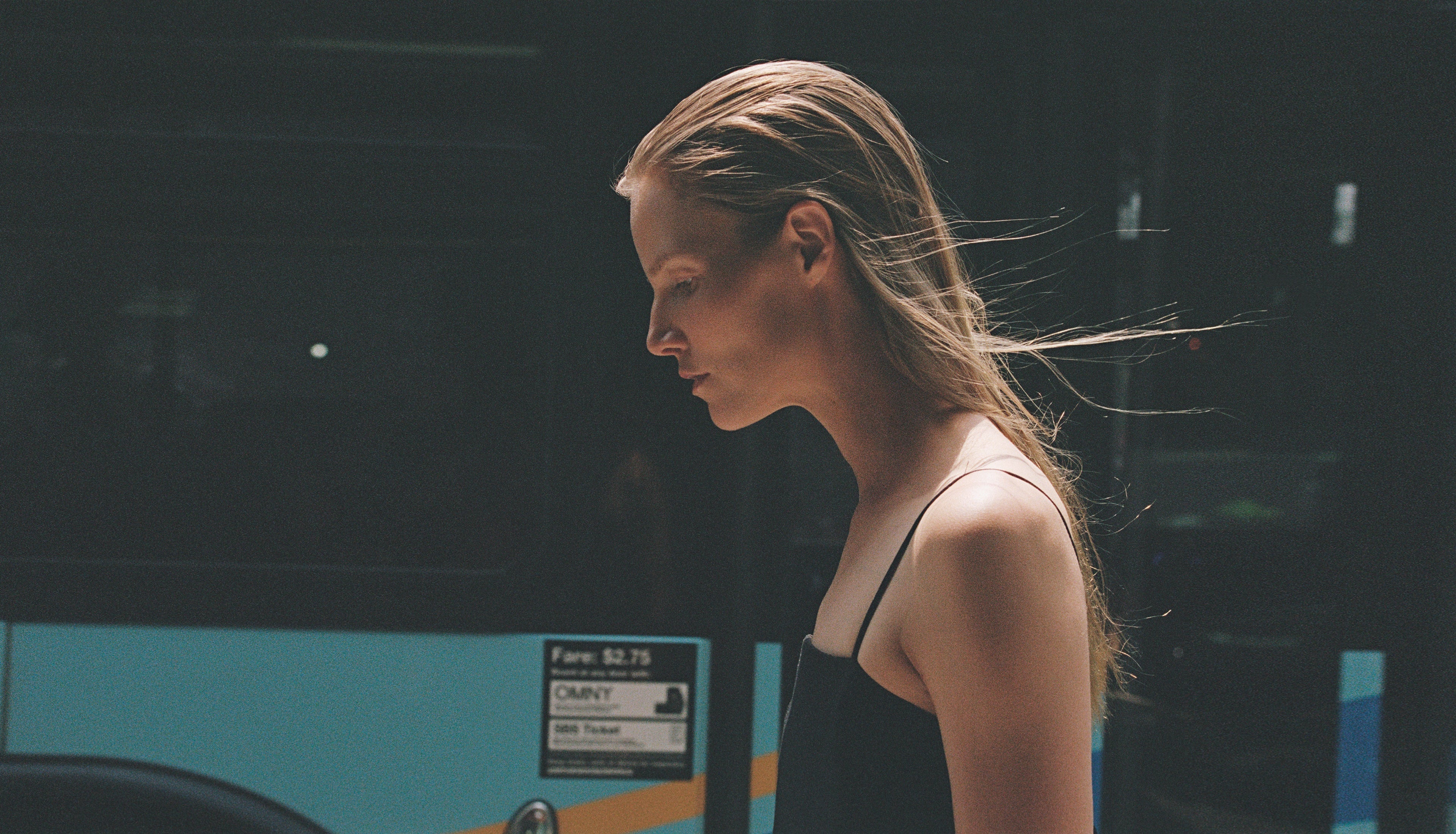 Model walking through the street wearing By Malene Birger.
