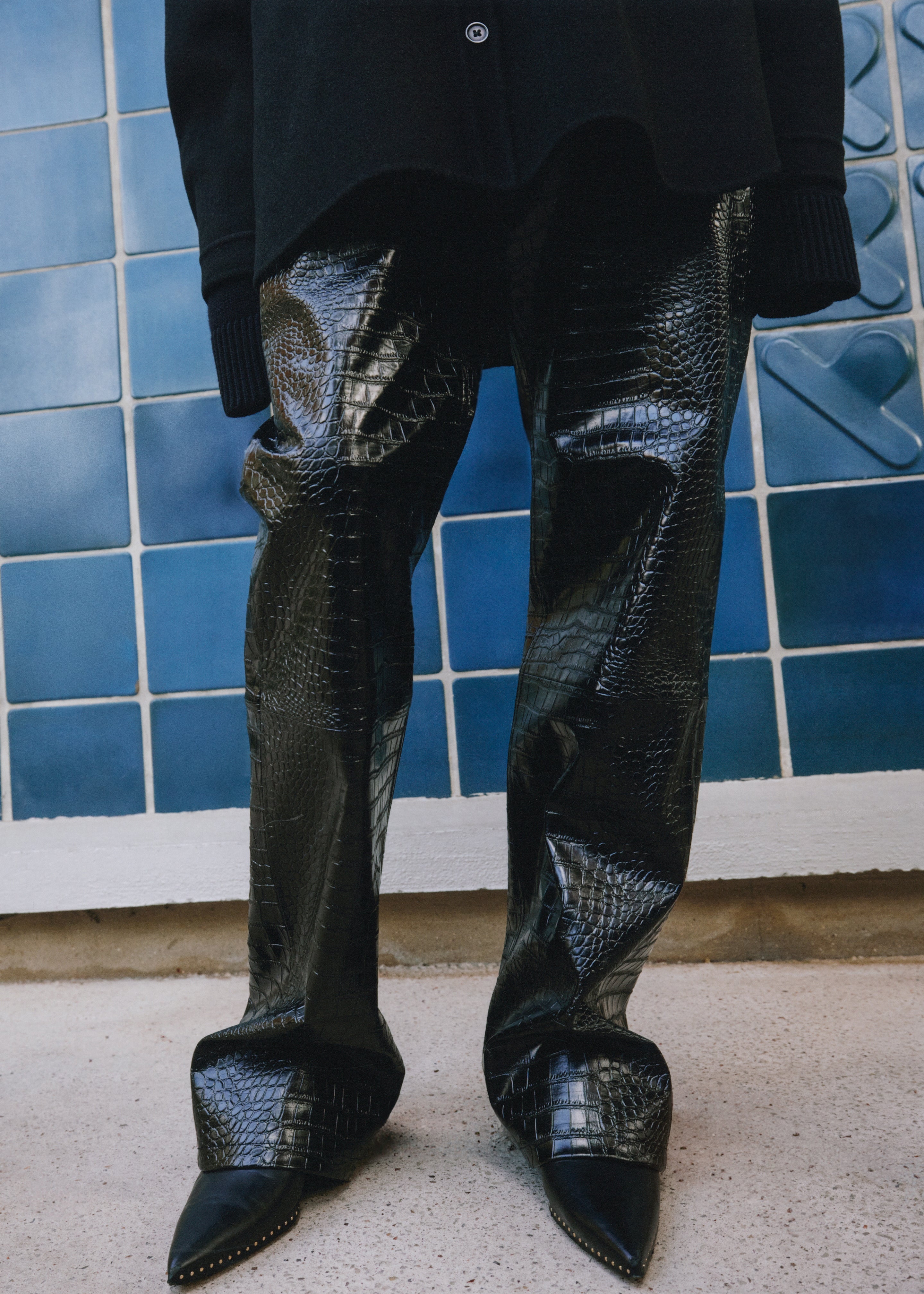 Black crocodile textured faux leather pants