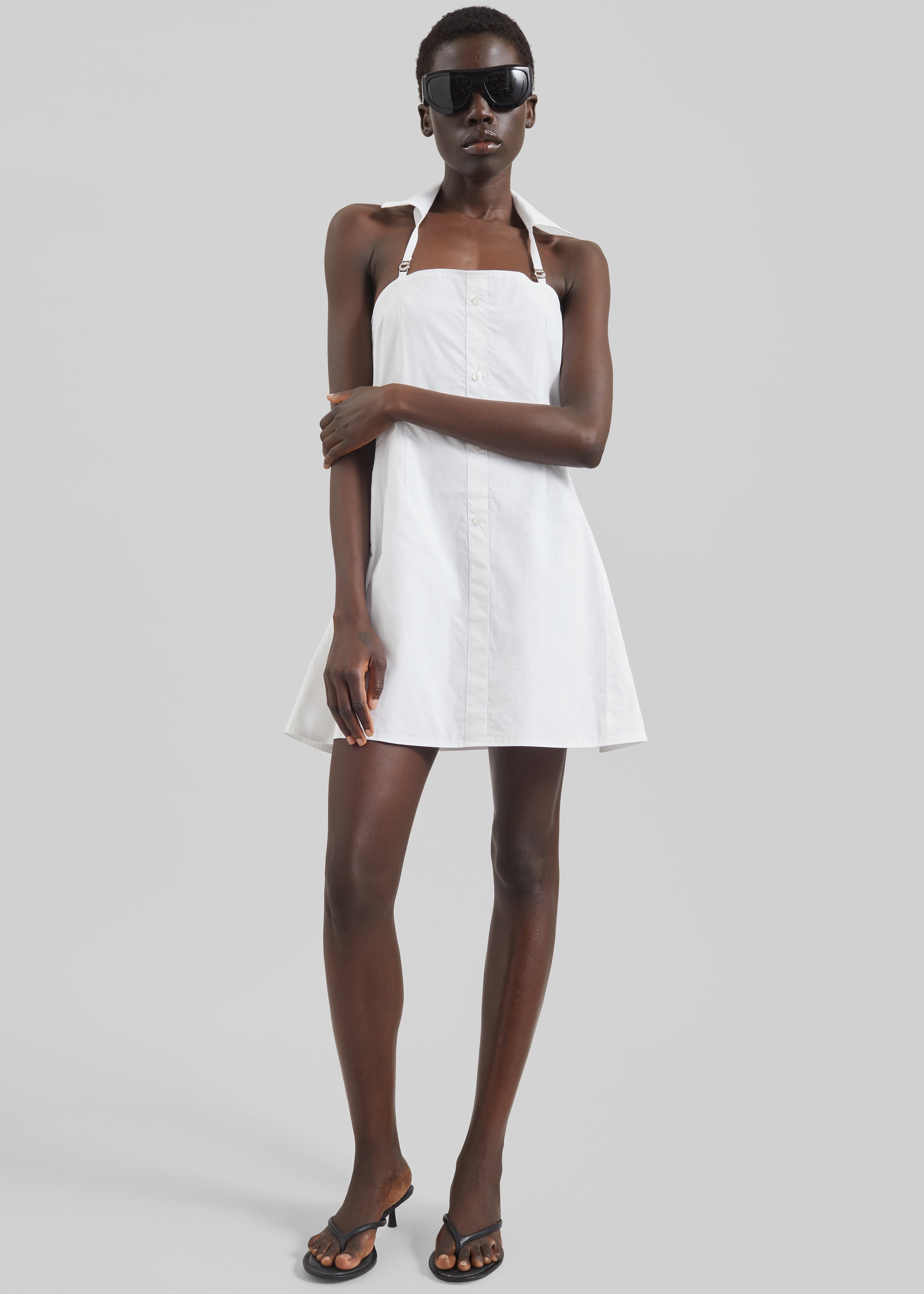 white baby doll dress Diaz Bow Back Babydoll Mini Ivory White mini dress Lined Ruffle sleeves Tie feature in back Zipper in back Youll look like an angel in our ethereal Marlina mini dress Coperni Collared Babydoll Dress -