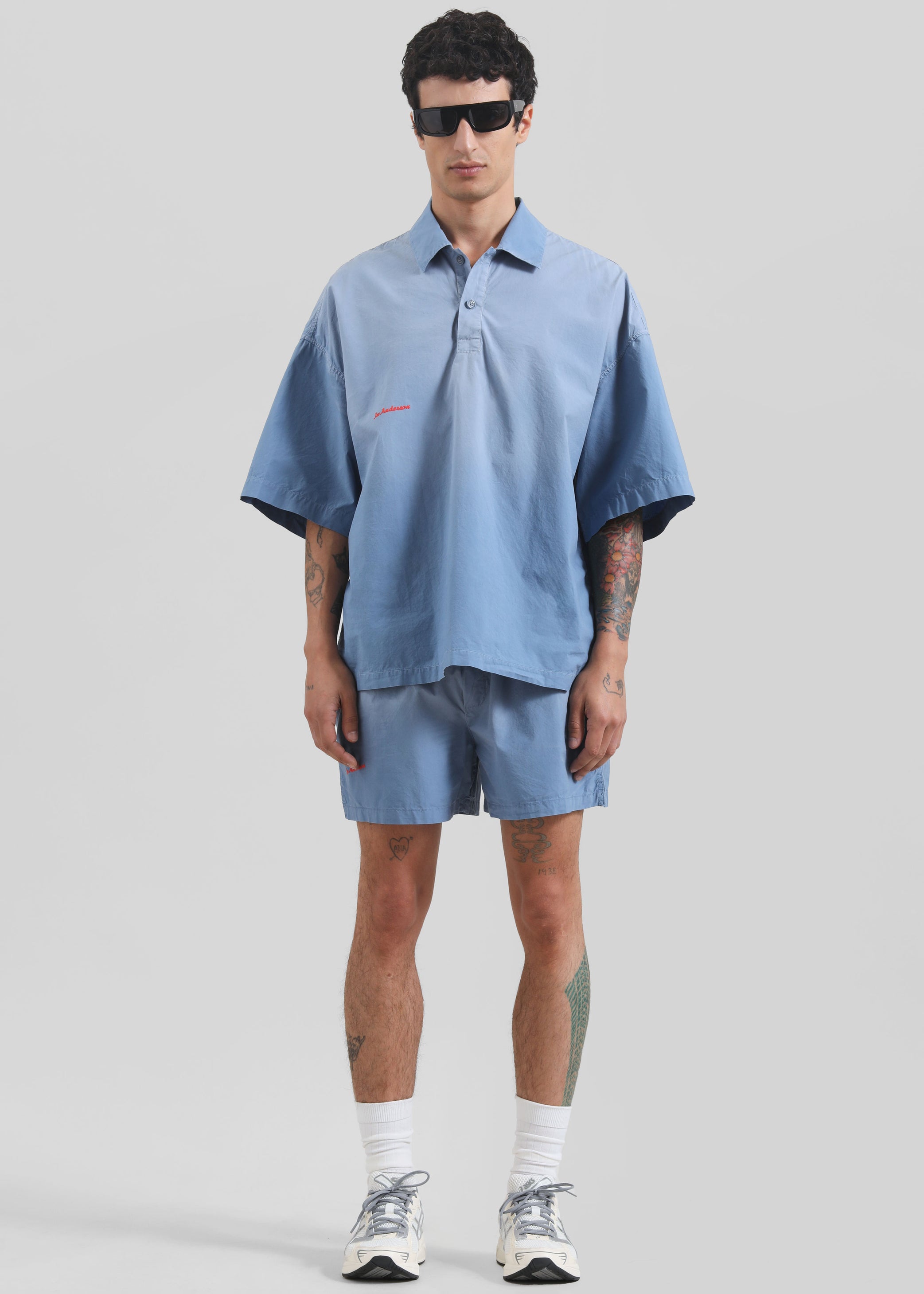 Shop the look image for JW Anderson Oversized Logo Polo Shirt - Light Blue