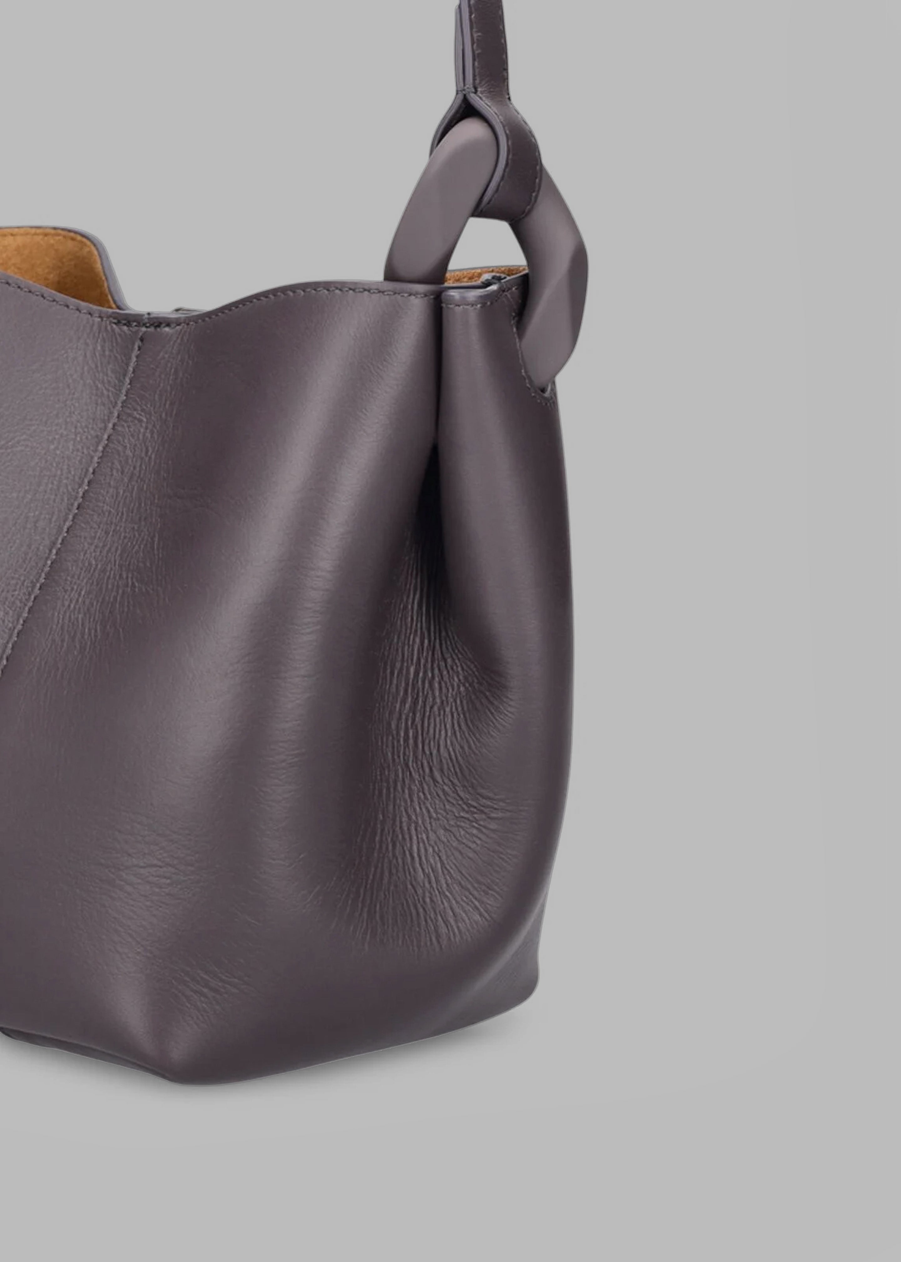 JW Anderson JWA Corner Leather Bucket Bag - Deep Mauve – The 