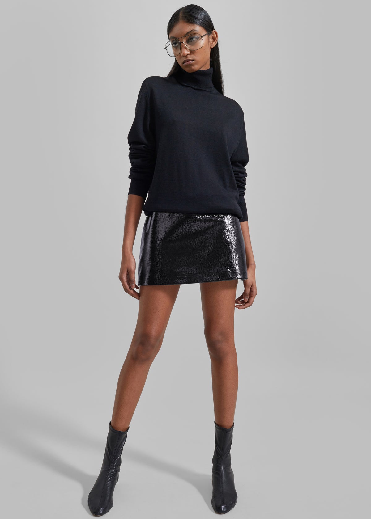 Black Leather Mini Skirt With Sweater Black Leather Mini Skirt