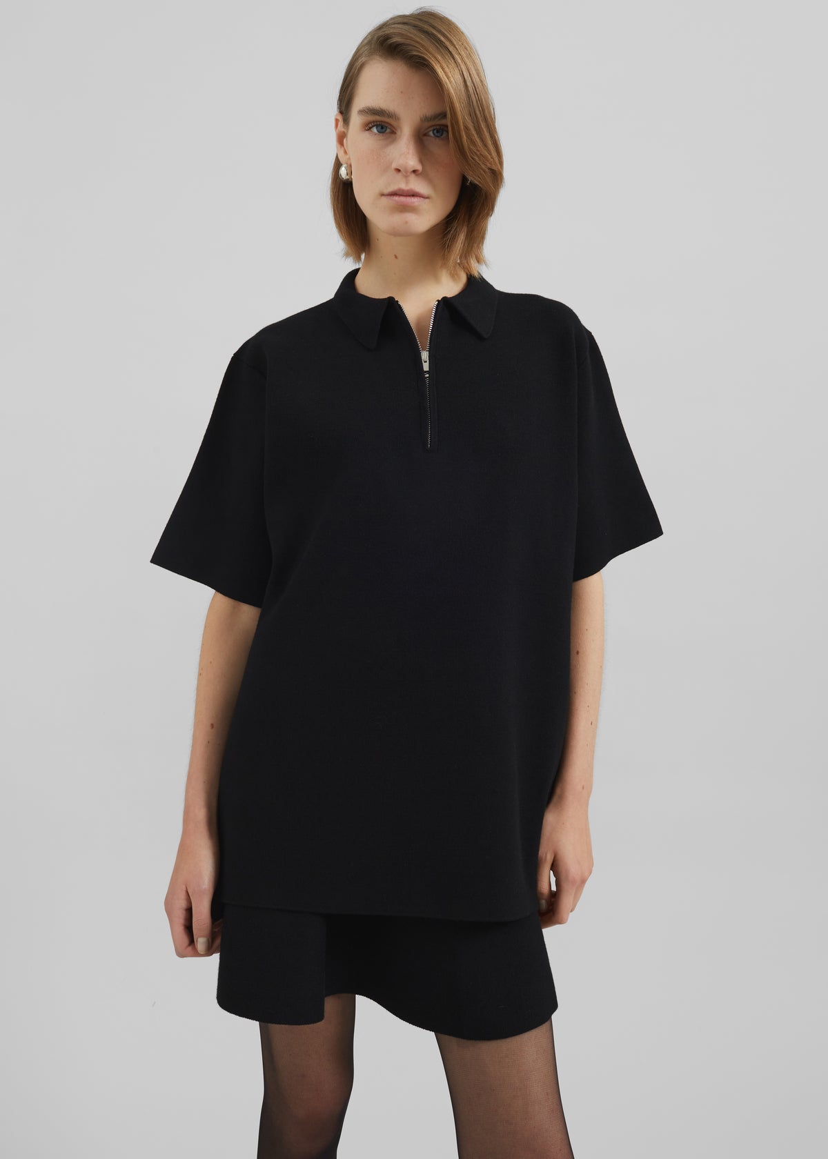Riya Zip-Up Polo Black – The Frankie Shop - Main Image