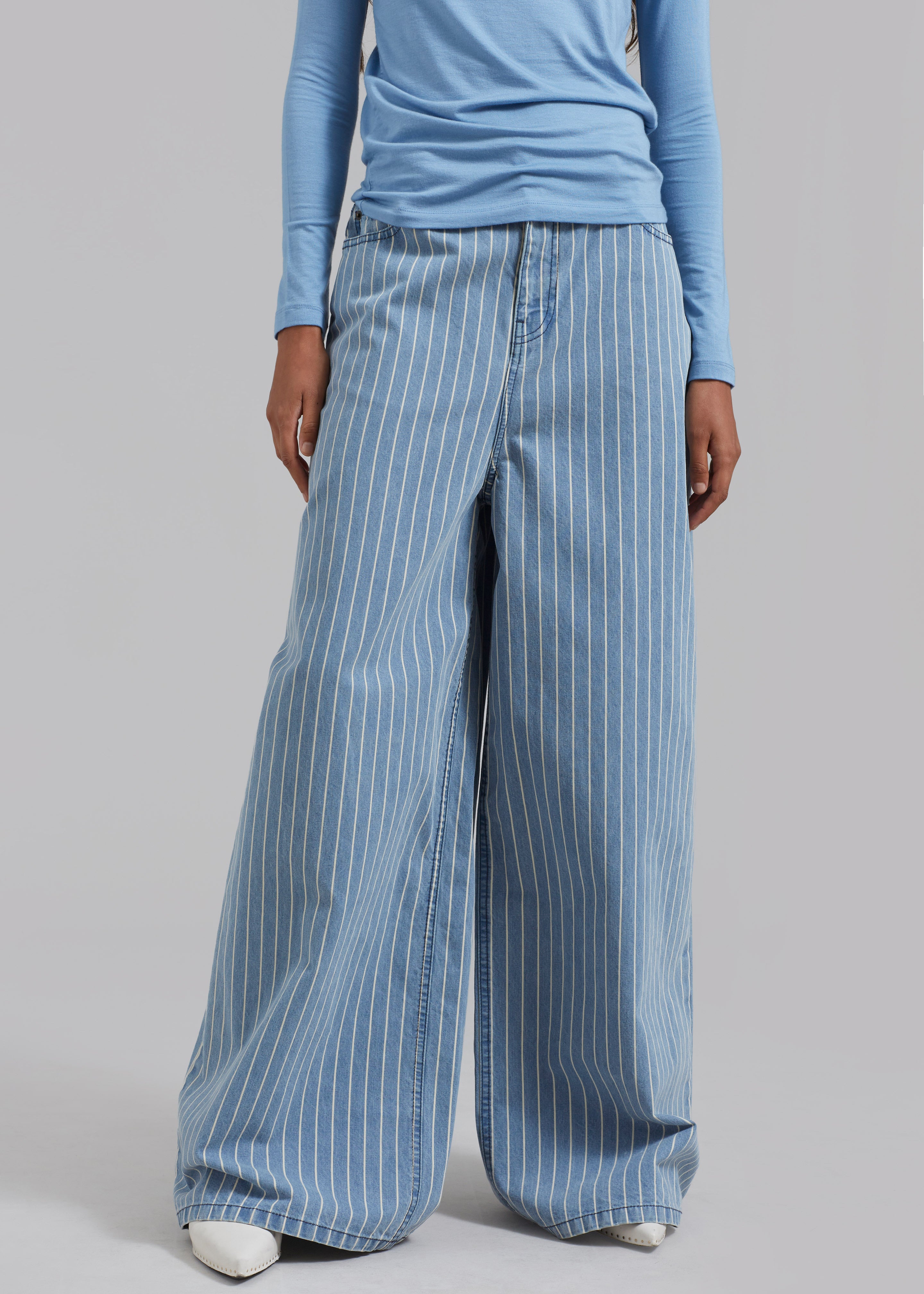 Shops light blue and white striped jeans