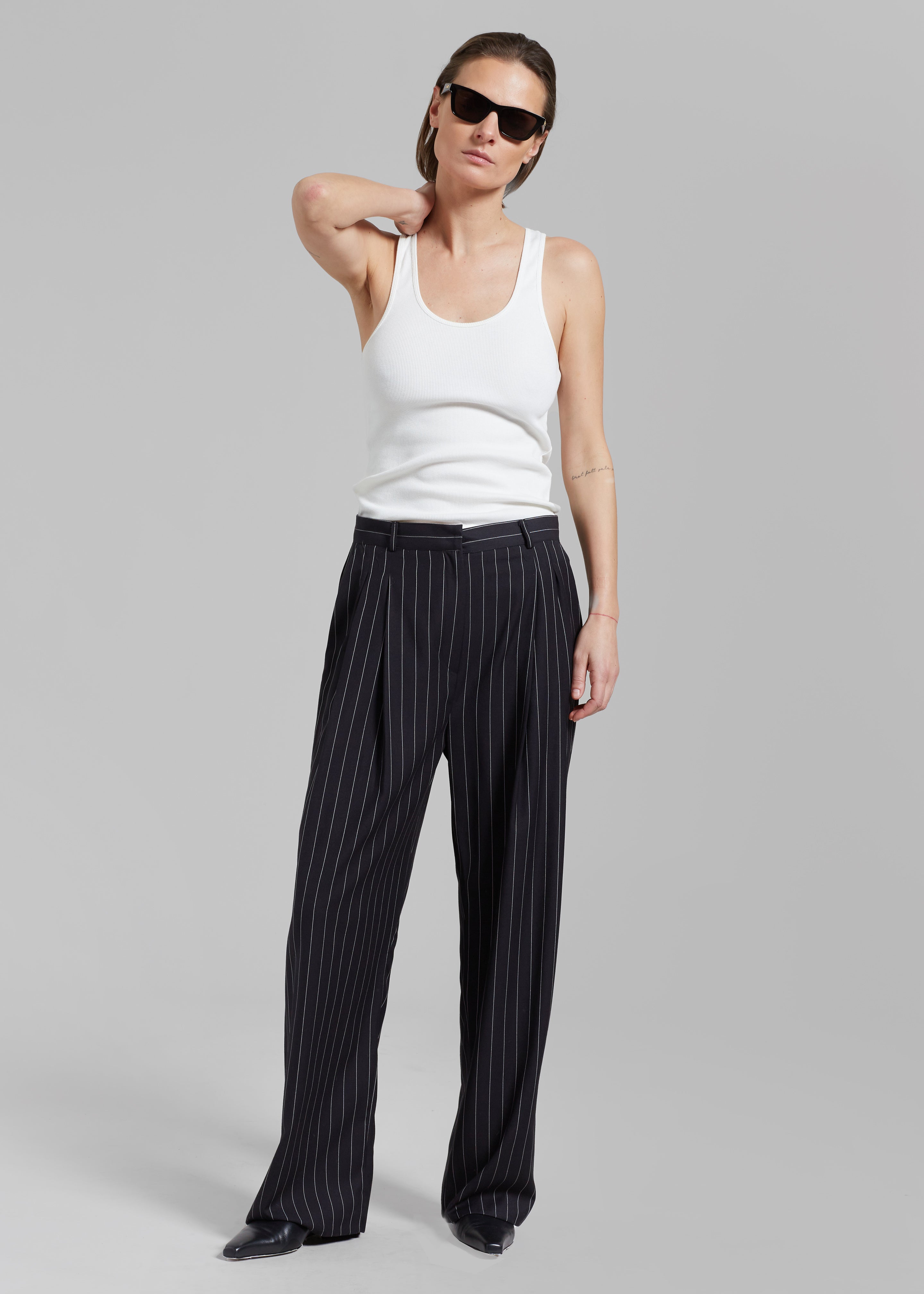 Buy online Black Cotton Pleated Trousers from bottom wear for Women by W  for ₹1600 at 38% off | 2024 Limeroad.com