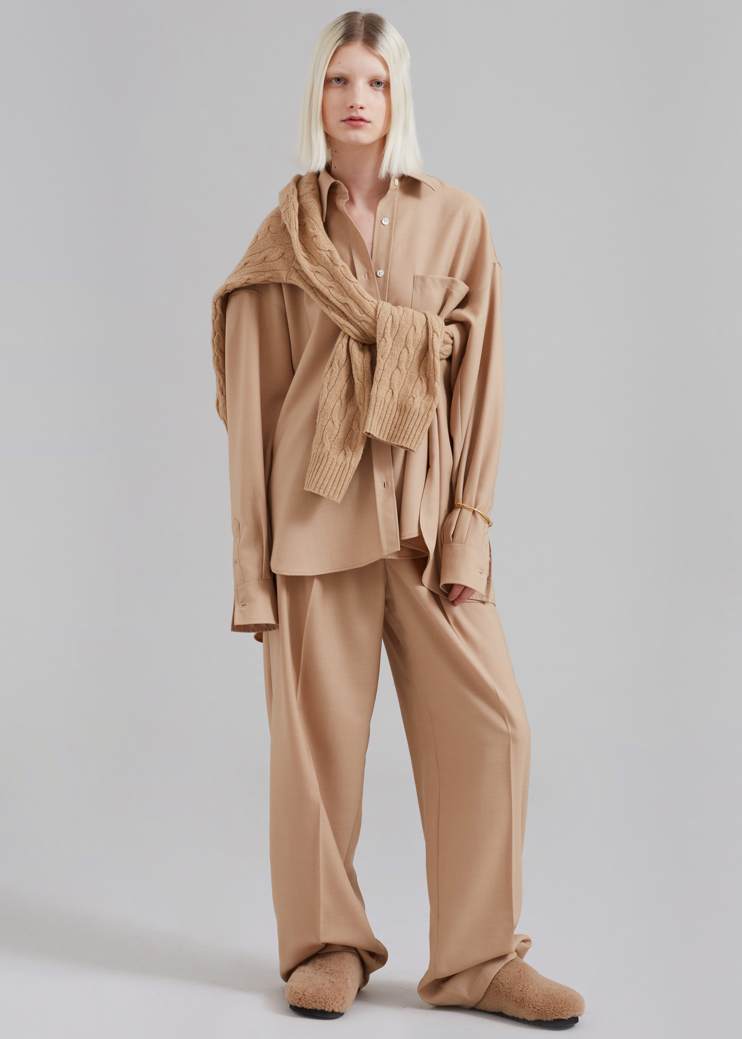 Flared stretch trousers - Beige - Ladies | H&M IN
