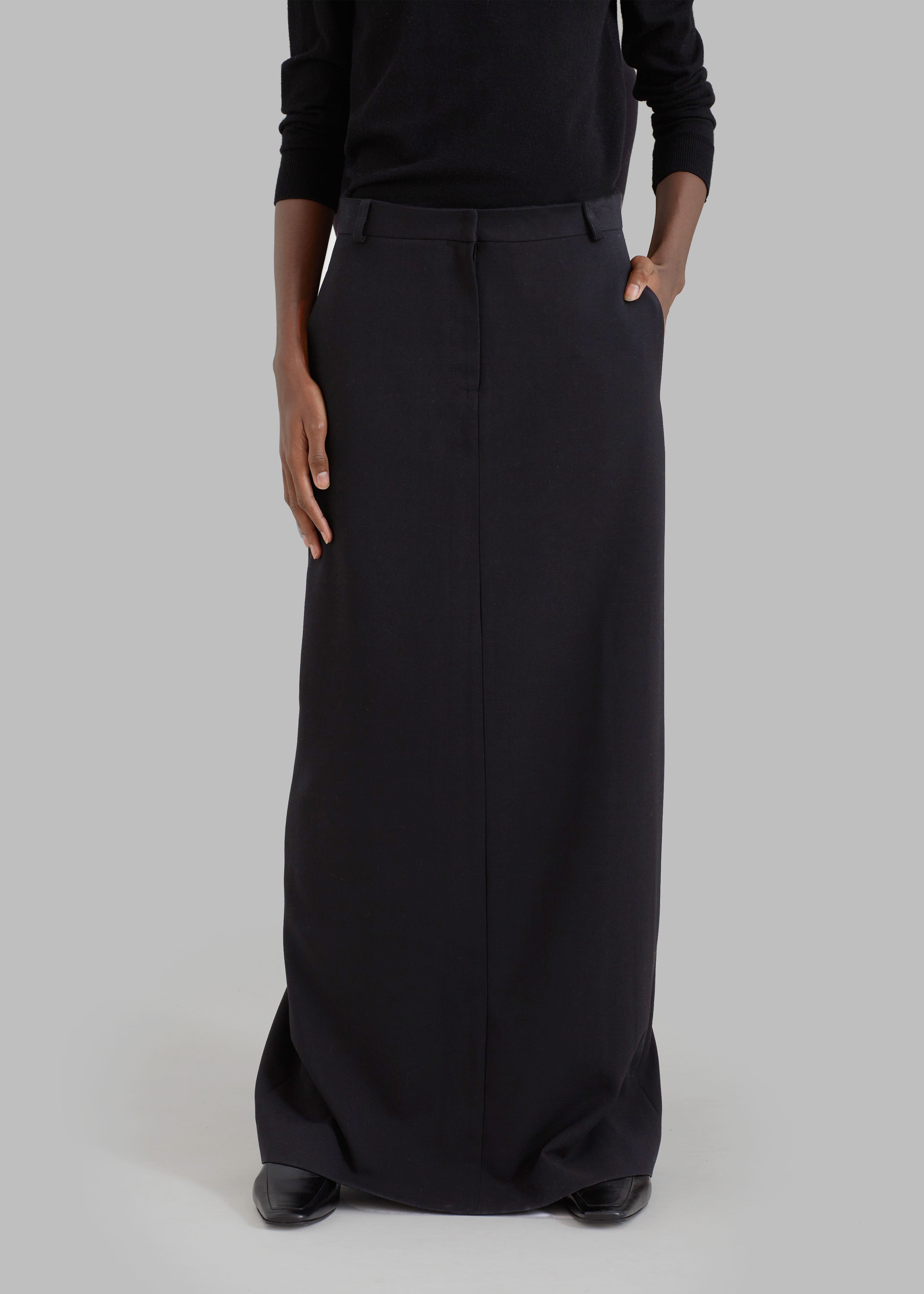 The Elegance of the Black Long Pencil Skirt