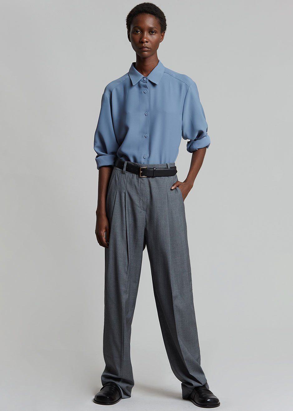 https://thefrankieshop.com/cdn/shop/products/gelso-pleated-trousers-dark-grey-melange-pants-the-frankie-shop-758747.jpg?v=1644409200&width=2880